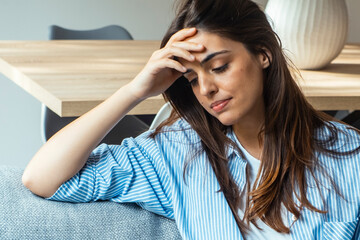 Sad, unhappy. Alone thoughtful young woman, girl expression face thinking about problem, difficulty, feeling failure and exhausted, suffering from loneliness, grief sorrow and bad relationship break