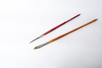 Paint brushes isolated on white background. Art supplies.
