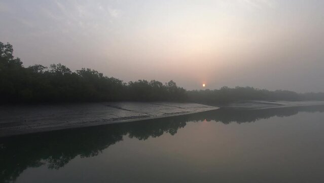 Sun setting behind the mangroves of Sundarbans national park