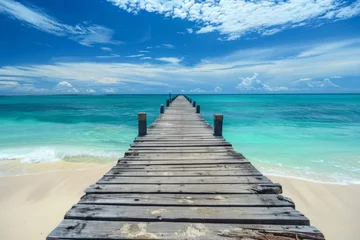 Küchenrückwand glas motiv Wooden pier leading to the ocean with a white sand beach and turquoise water, tropical island background, copy space for text in a wide format in the style of tropical island background. © Denis