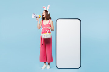 Full length body young woman wear pink casual clothes rabbit bunny ears big huge blank screen...