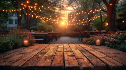   A wooden table, adorned with lit candles, stands beside a sprawling forest brimming with pink blossoms and an abundance of green foliage - obrazy, fototapety, plakaty
