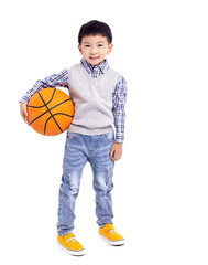Happy asian Boy  holding a basketball and smiling isolated on white background