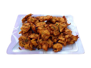 A plate filled with crispy and tasty Pakora - Street Food