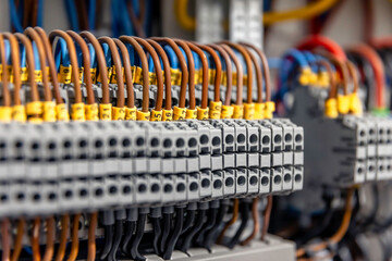 Electrical panel with fuses and contactors, close-up.