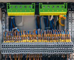 Electrical panel with fuses and contactors, close-up.