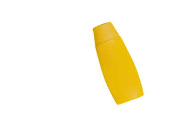 Yellow sunscreen bottle on colored background. Sunscreen concept. Skin care concept. Space for text. Mockup.