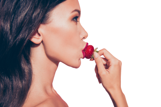 Close-up profile side view portrait of lovely sweet attractive feminine glamorous wavy-haired lady eating biting licking tasting dessert isolated on pink background - Powered by Adobe