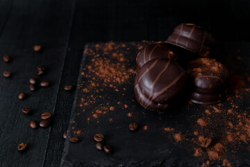 Coffee with chocolate chips. on a dark background.
dessert