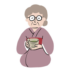 茶会でお茶をいただくおばあさん
