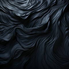 A luxurious expanse of black fabric with a wave-like texture creates a dynamic and tactile visual experience.