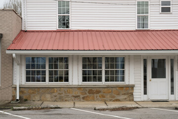 Vintage Building With Red Tin Roof