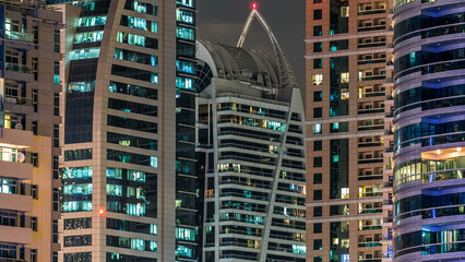 Close View of Dubai Marina towers in Dubai at night timelapse
