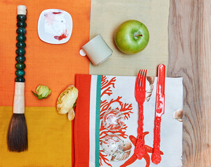Decorative kitchen cloth style with plate vegetable and tool, up view.