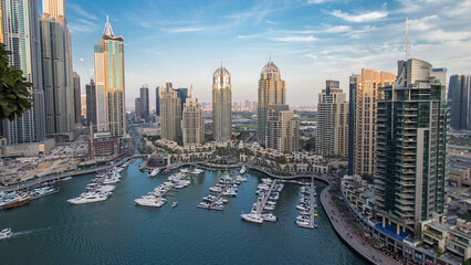 Aerial top view day to night timelapse of Dubai Marina in Dubai, UAE