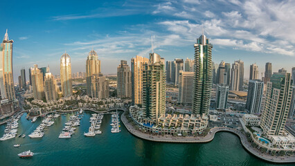 Aerial top view at sunset timelapse of Dubai Marina in Dubai, UAE
