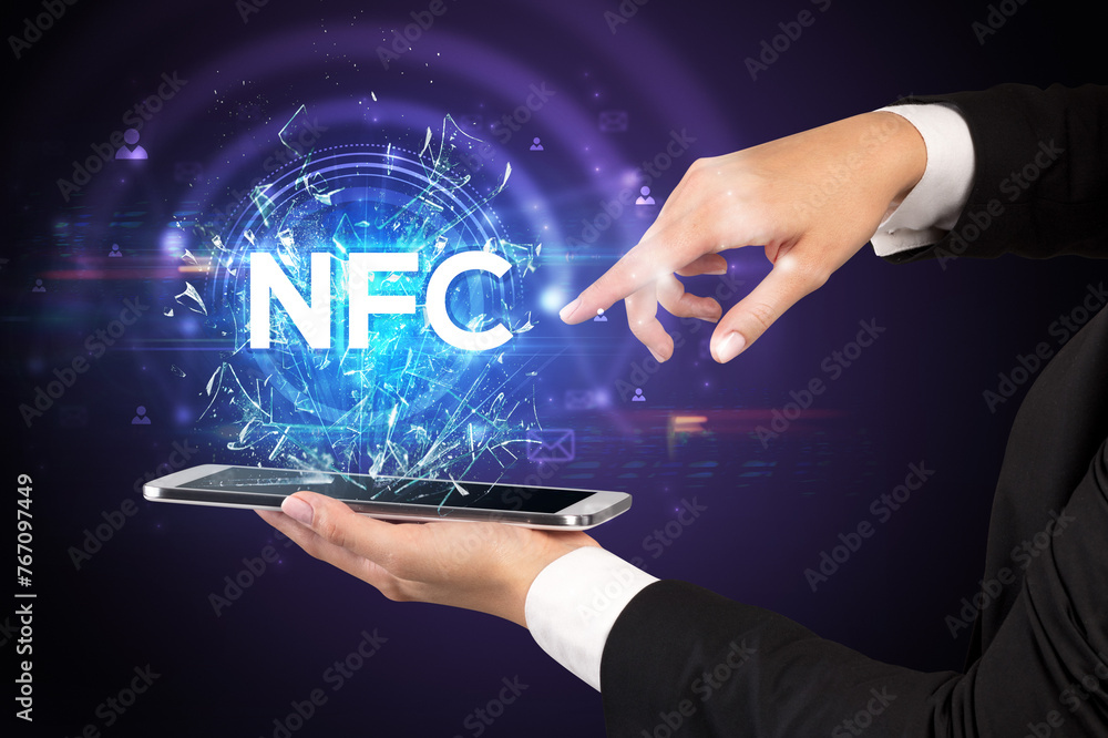 Poster Close-up of a touchscreen with abbreviation.