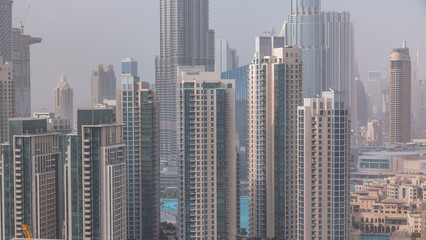 Downtown Dubai skyline with residential towers timelapse, view from rooftop.