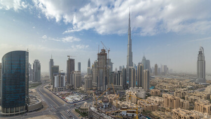 Naklejka na ściany i meble Beautiful luxury Dubai downtown aerial top view all day timelapse, Dubai, United Arab Emirates