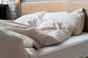 Stylish bed with bed linen