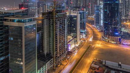 Dubai business bay towers night timelapse aerial