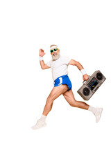 Dreamy cheerful excited sporty aged funny sexy grandpa in eyewear with recorder in hand. Old...