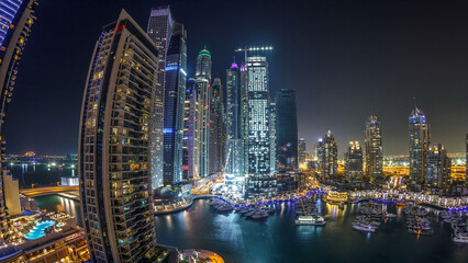 Fototapeta na wymiar Dubai Marina at night timelapse, Glittering lights and tallest skyscrapers