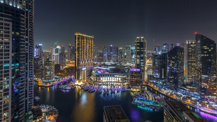 Fototapeta na wymiar Night illumination of Dubai Marina aerial timelapse, UAE.