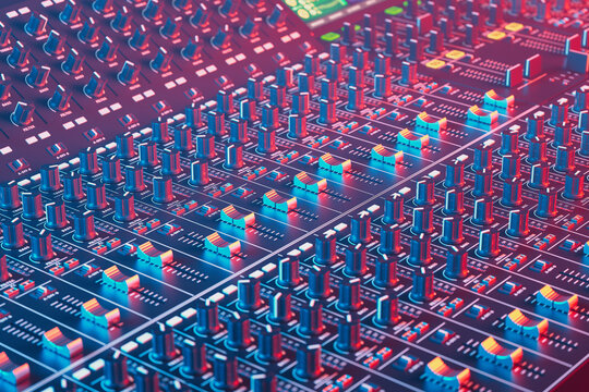 Close-Up View of a Professional Audio Mixing Console in a Music Studio