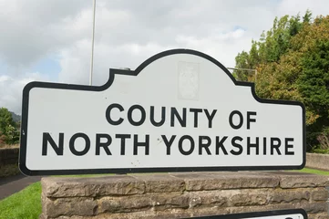 Fototapeten Sign on the North Yorkshire county border. © Richard