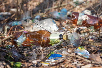 Illegal garbage dump in nature. Dirty garbage polluting the environment