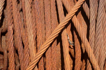 Fototapeten Rusty cables on a drum in Provincetown harbor © Richard