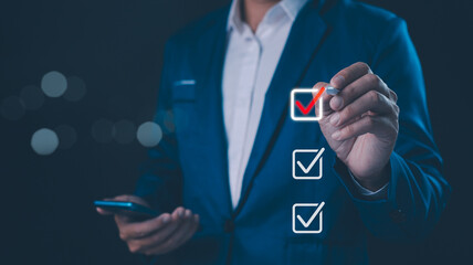Checklist concept, Businessman mark checkboxes, Survey form, check marks on checklist, filling online form and answering questions. List options business employee security procedures followed office. - obrazy, fototapety, plakaty