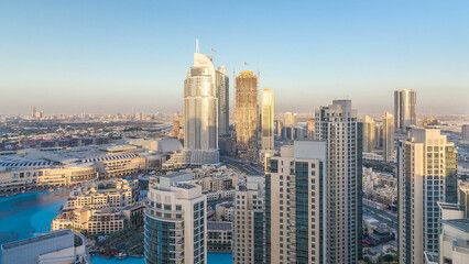 Dubai downtown in the evening timelapse in bright yellow sunset light