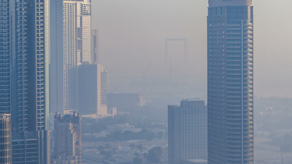 Foggy morning in downtown of Dubai timelapse.