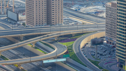 Traffic on a busy intersection on Sheikh Zayed highway aerial timelapse