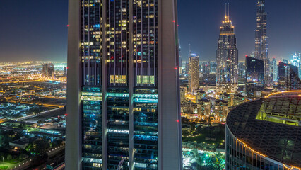 Dubai downtown skyline night timelapse with tallest building and Sheikh Zayed road traffic, UAE