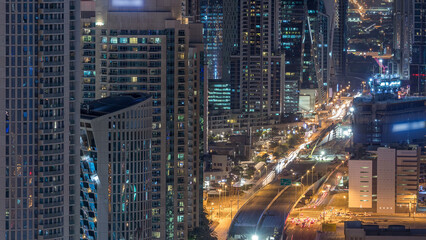 Dubai Downtown night timelapse modern towers view from the top in Dubai, United Arab Emirates.