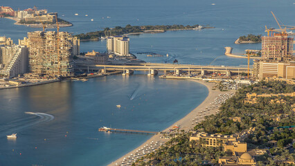 Aerial view of Palm Jumeirah Island timelapse.