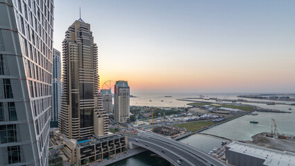 JBR and Dubai marina after sunset aerial day to night timelapse