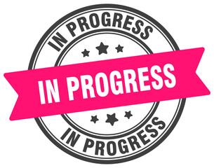 in progress stamp. in progress label on transparent background. round sign