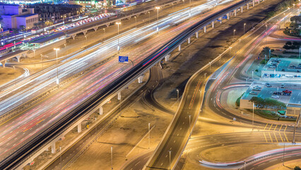 Naklejka premium Sheikh Zayed Road traffic in Dubai Marina and Jumeirah Lakes Towers districts night timelapse