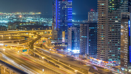 Aerial view of a sheikh zayed road intersection in a big city timelapse.