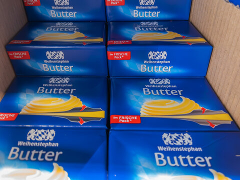 Stacks of Weihenstephan Butter Packages in Store