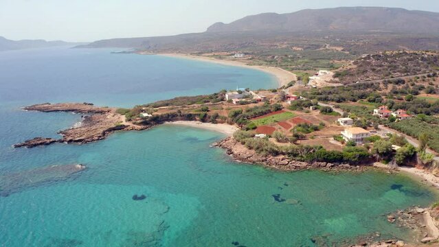 4k drone flight moving to the side footage (Ultra High Definition) of Pyla beach, Demonia village location. Fantastic morning seascape of Mediterranean sea. Spectacular summer scene of Greece, Europe.