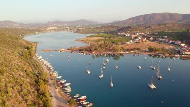 4k drone flight down footage (Ultra High Definition) of Vivari port. Splendid outdoor scene of Peloponnese peninsula, Greece, Europe. Beautiful morning seascape of Mediterranean sea.