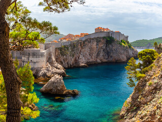 Dubrovnik Old town with turquoise water bay on Adriatic sea, Dalmatia, Croatia. Medieval fortress...