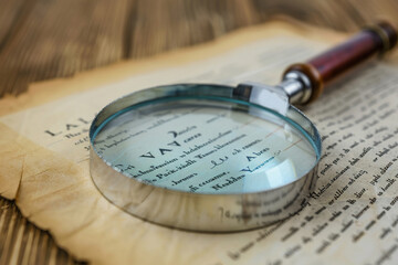 A magnifying glass over a document, representing the scrutiny of legal details for fairness