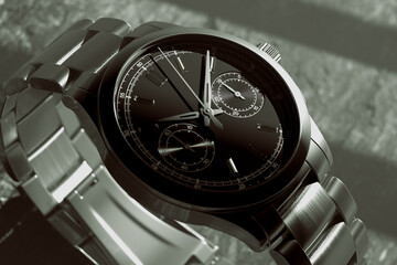 Fototapeta premium Close-Up of Sophisticated Luxury Chronograph Wristwatch with Metallic Bracelet