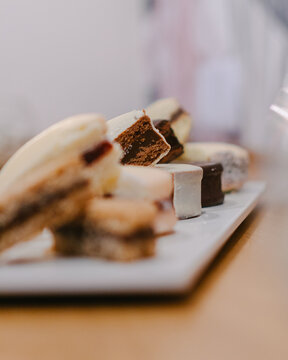 Fresh baked chocolate stuffed cookie from delicate coffee shop  over wood table